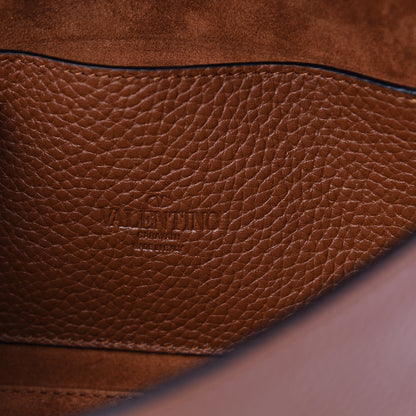 Valentino Garavani Pebbled Calfskin Medium Rockstud Flip Lock Crossbody Bag Saddle Brown 5 of 9