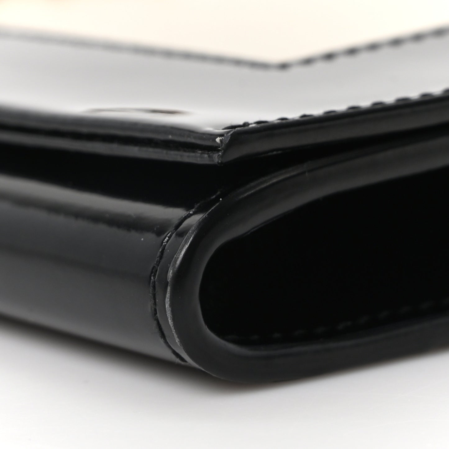 Nappa Patent Calfskin Two-Toned Monogram Pouch Alabastro Black