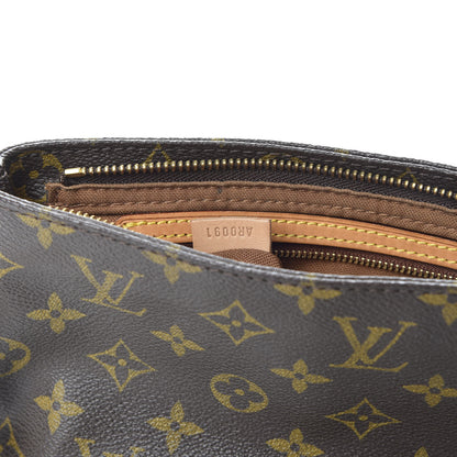 Louis Vuitton Monogram Trotteur 7 of 10
