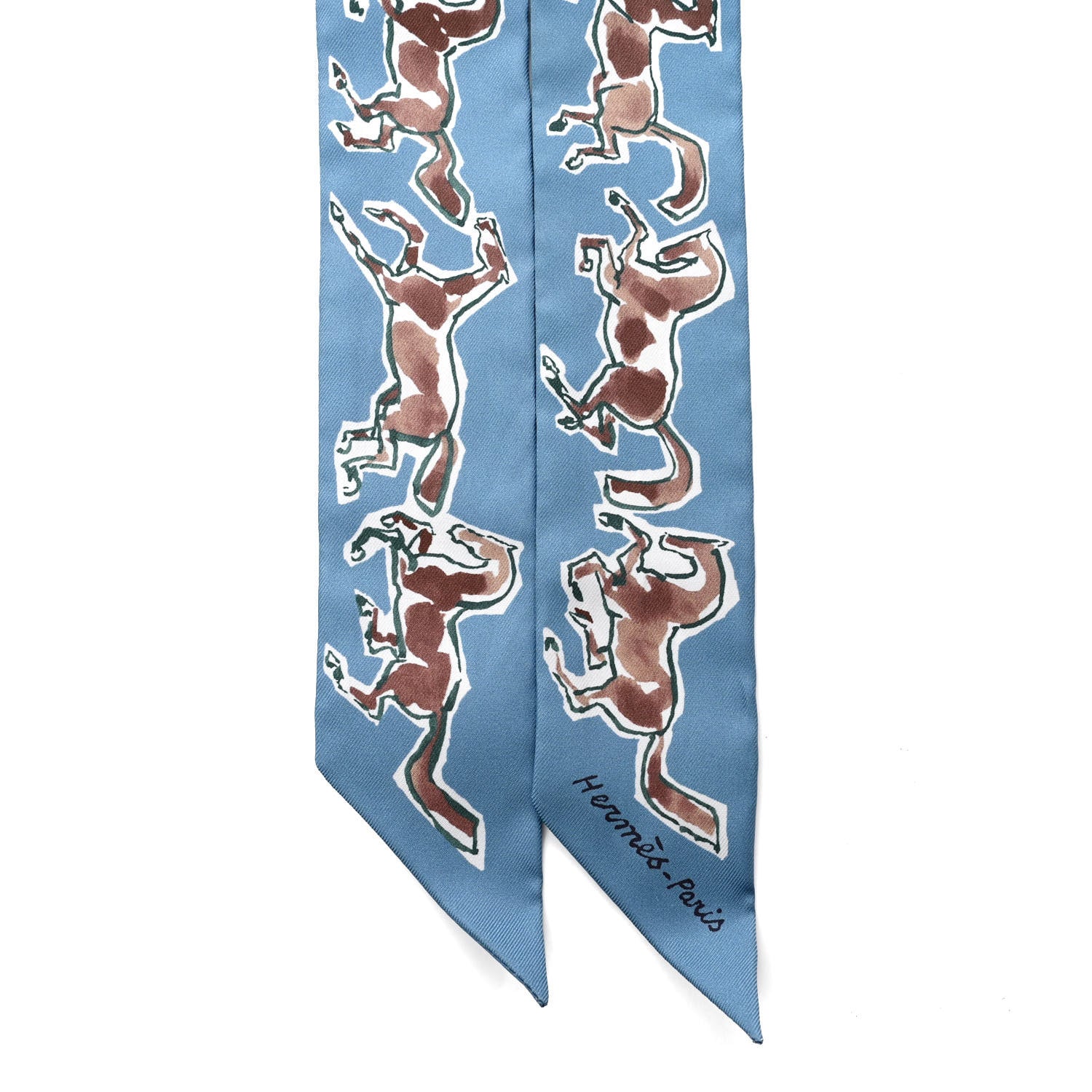 HERMES Silk Chevaux En Liberte Twilly in the colors Bleu Glacier Beige by fashionphile