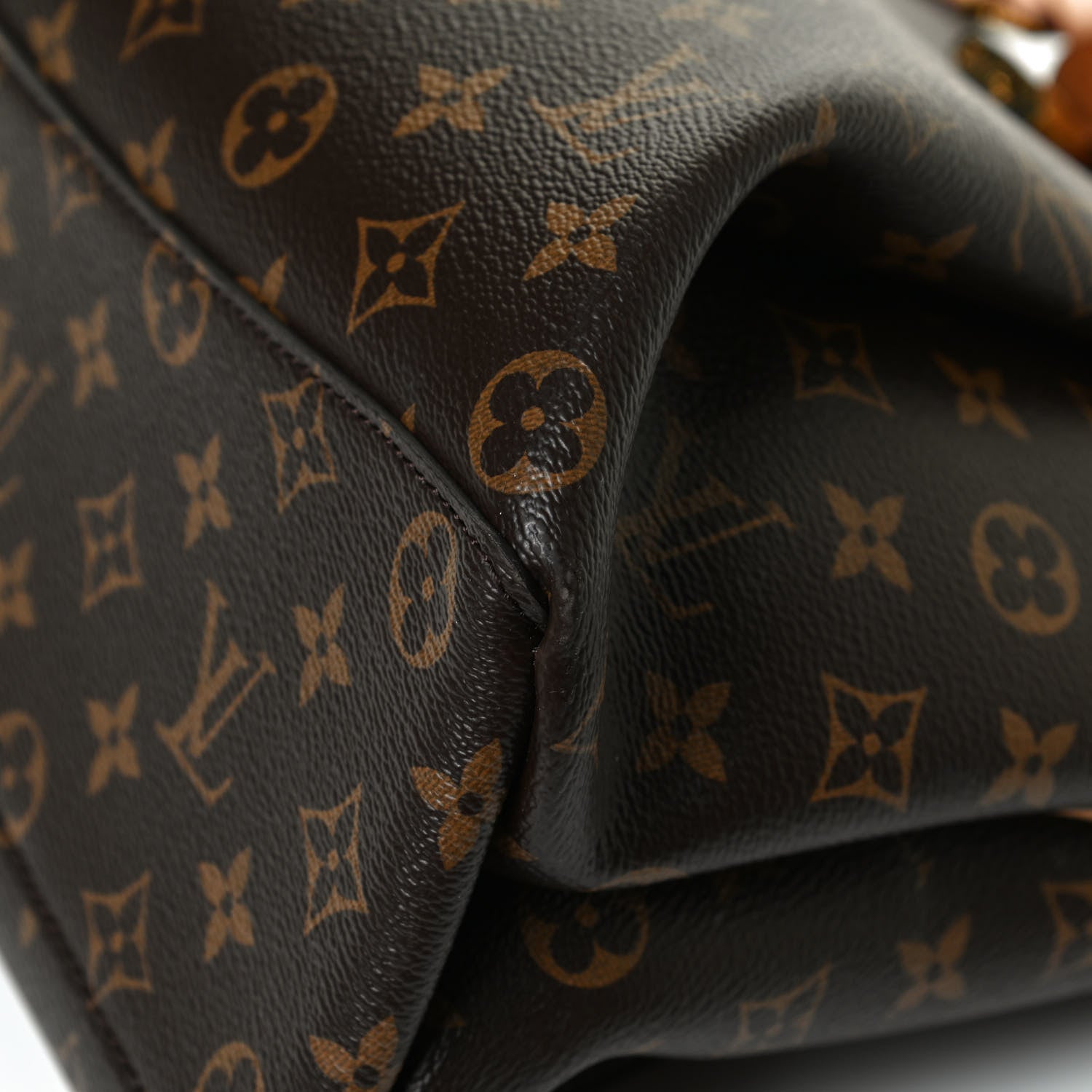 Louis Vuitton Monogram Rivoli MM 9 of 14