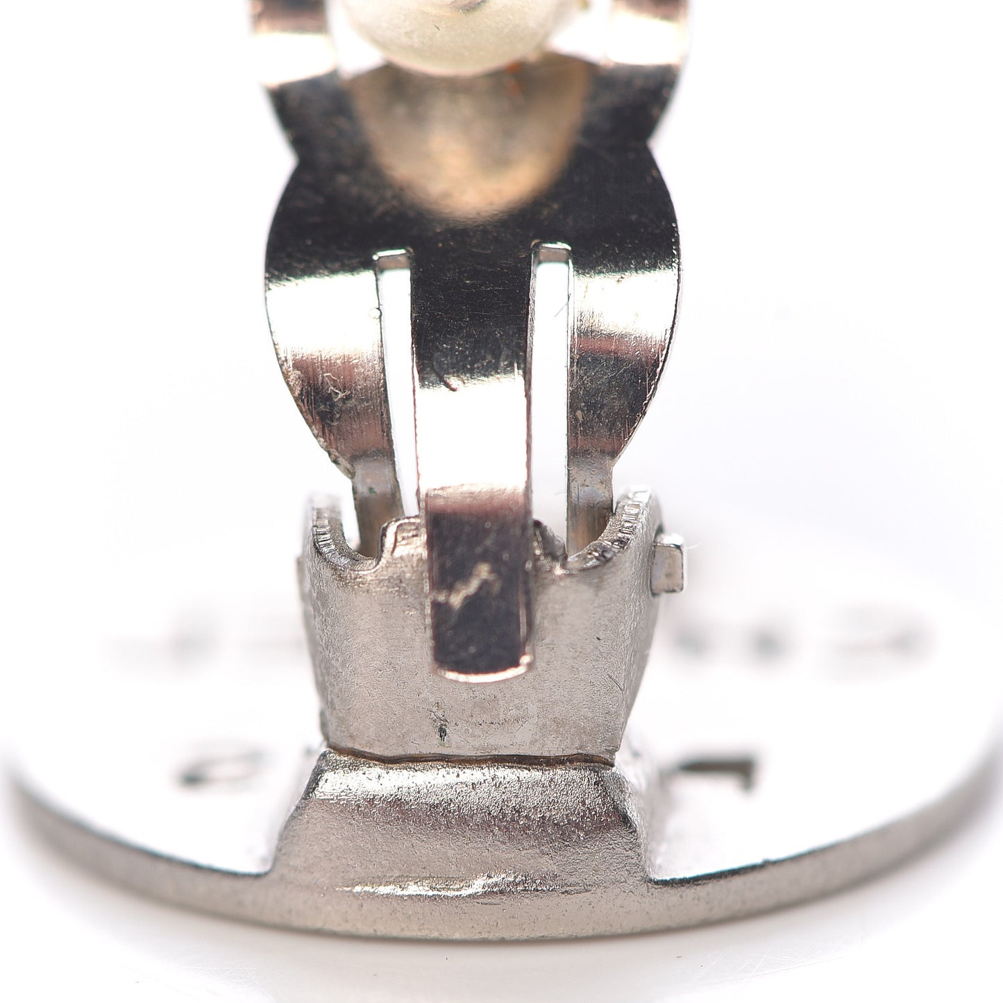 CHANE Logo Cutout Clip On Earrings Silver