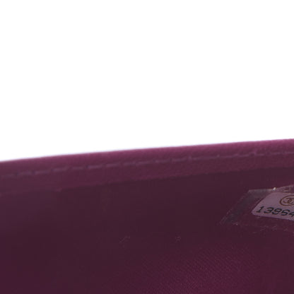 Chanel Lambskin Camellia Embossed Yen Wallet Fuchsia 8 of 12