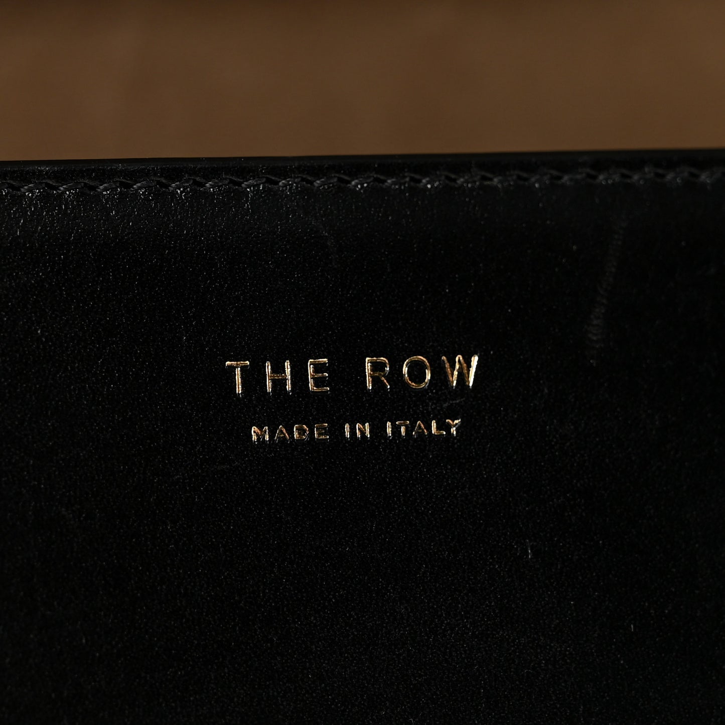 Sleek Calfskin The Sofia 10 Top Handle  Black