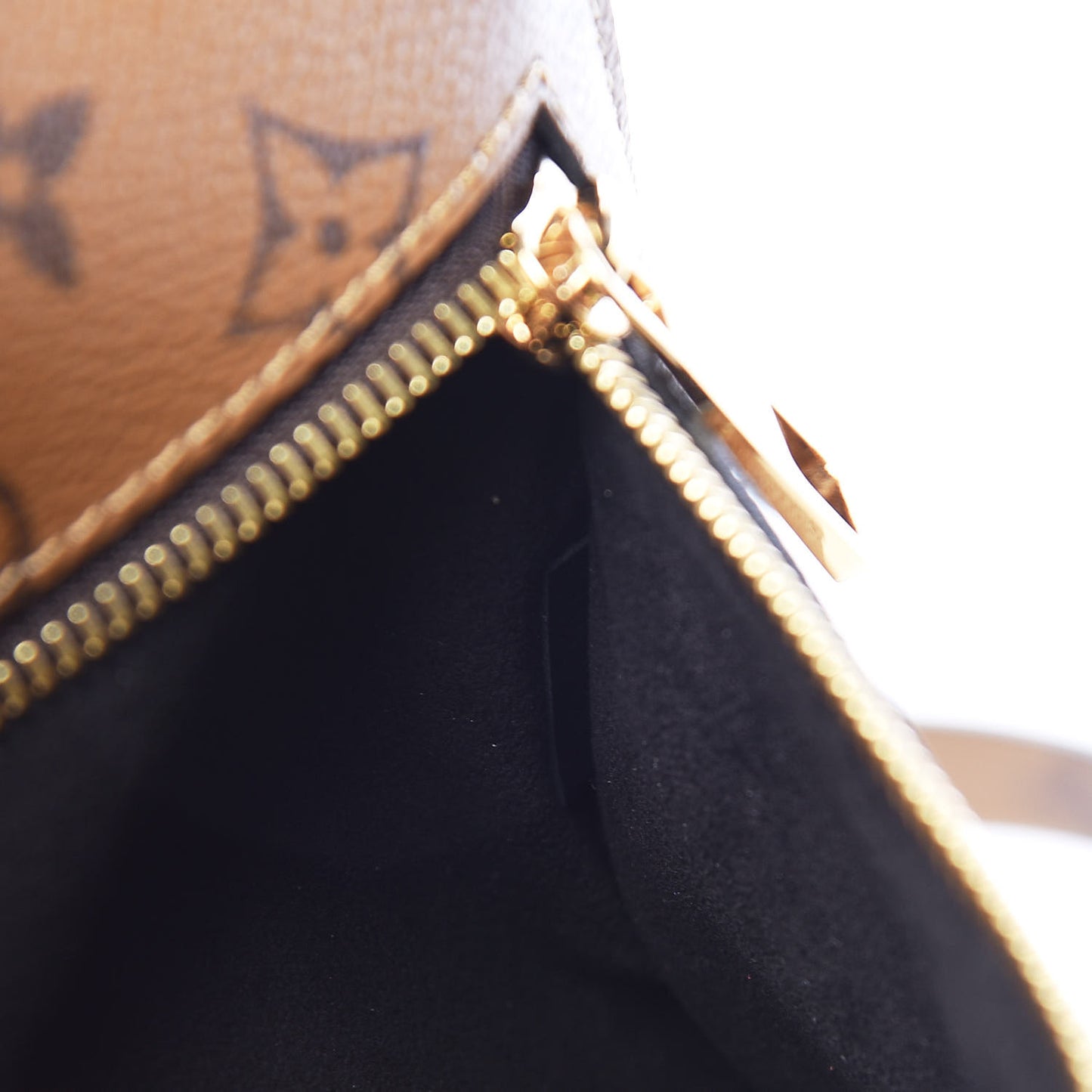 Reverse Monogram Pochette Metis