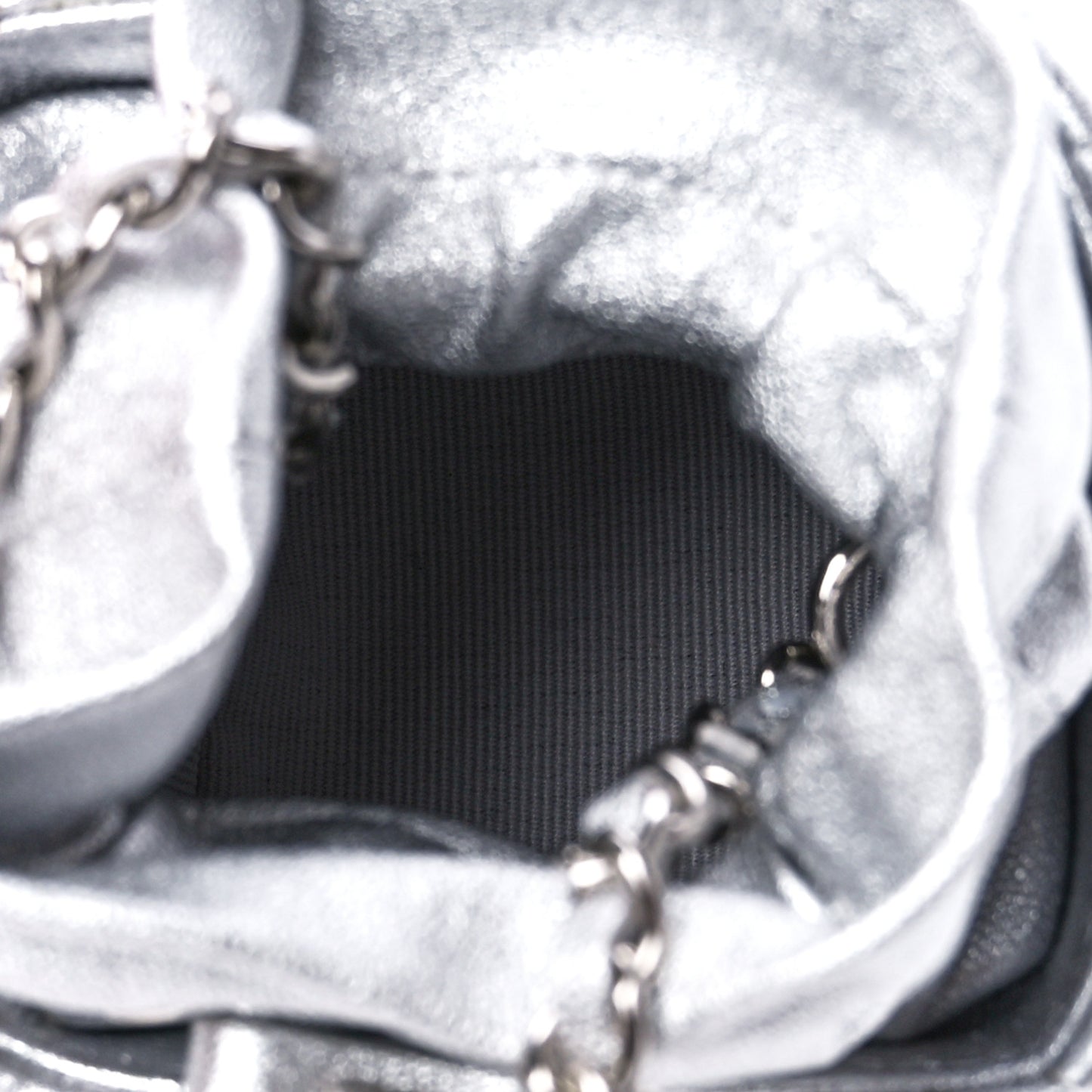 Metallic Caviar Quilted Mini Drawstring Bucket Bag Silver