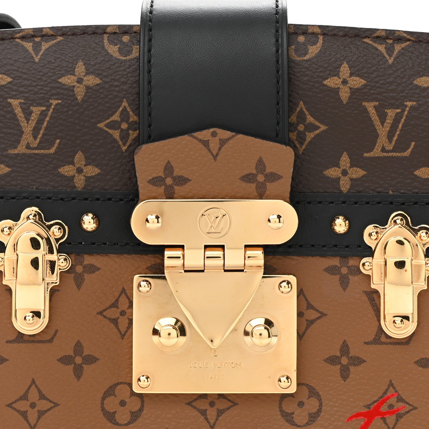 Reverse Monogram Trunk Clutch