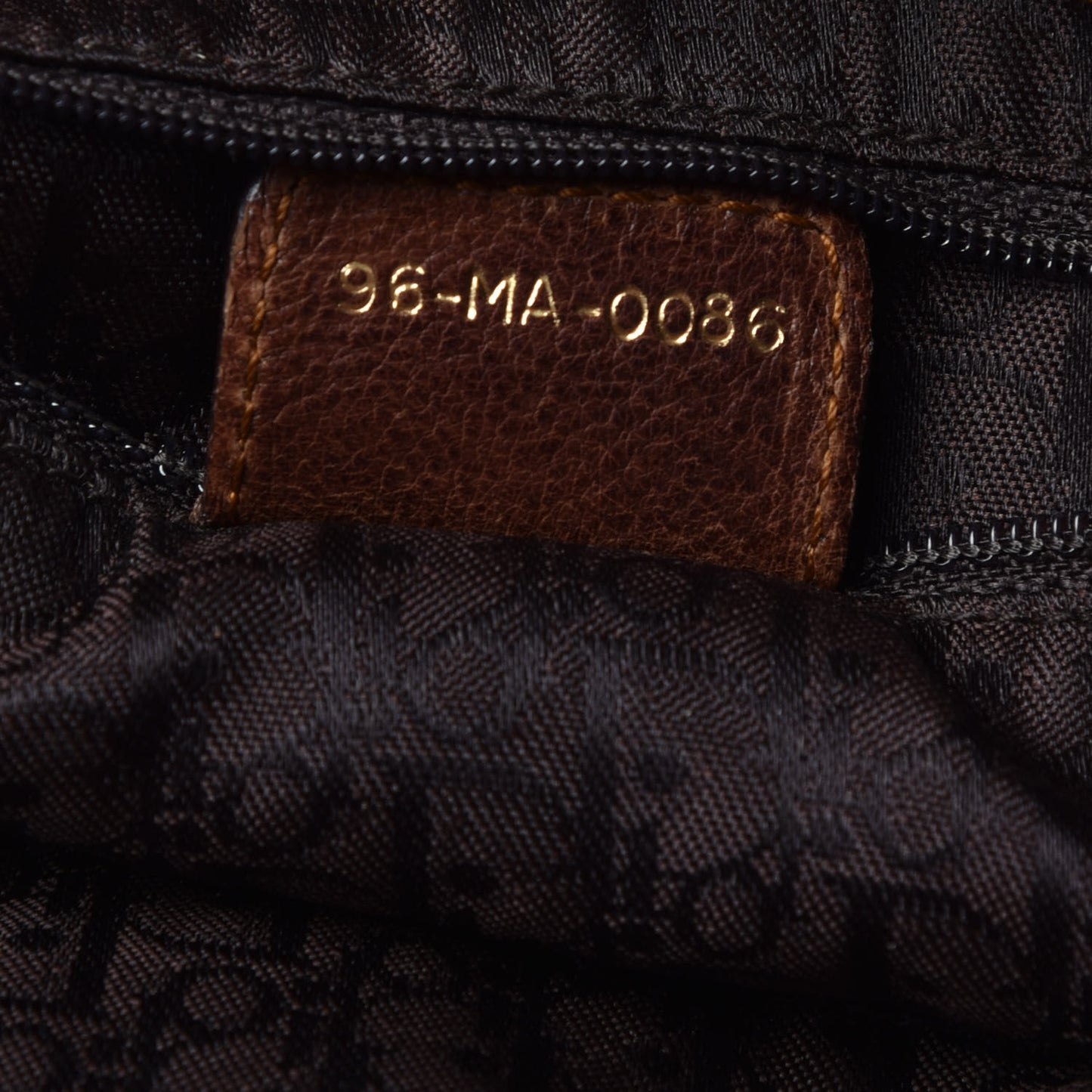 Lambskin Cannage Drawstring Bag Brown