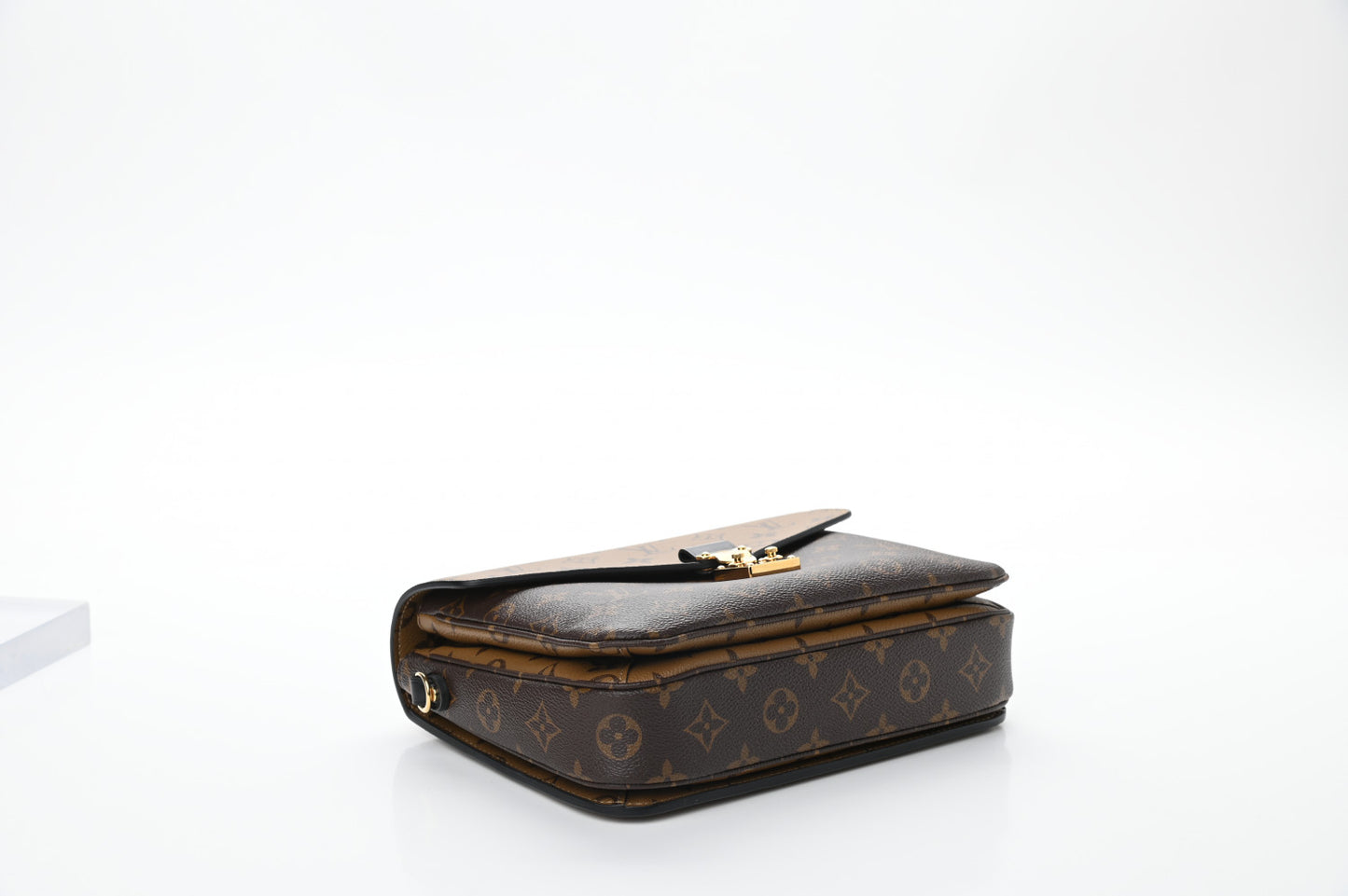 Reverse Monogram Pochette Metis