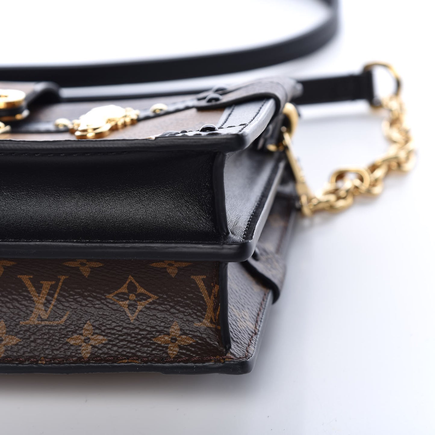 Reverse Monogram Trunk Clutch