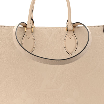 Louis Vuitton Empreinte Monogram Giant Onthego MM Creme 7 of 9