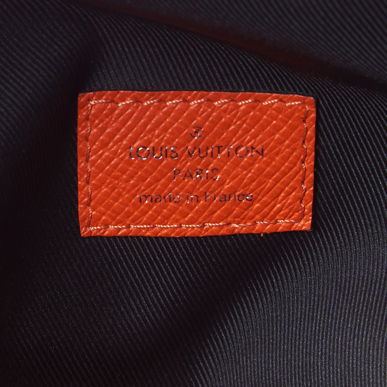 Taiga Monogram Discovery Backpack PM Orange