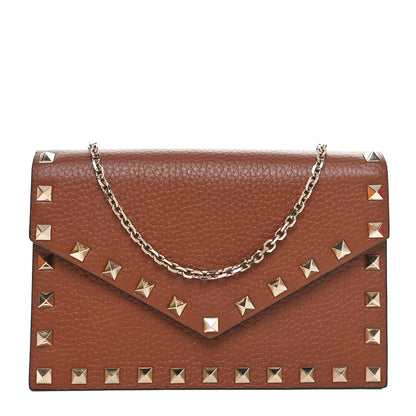 Valentino Garavani Pebbled Calfskin Rockstud Envelope Wallet on Chain Bright Cognac 1 of 10