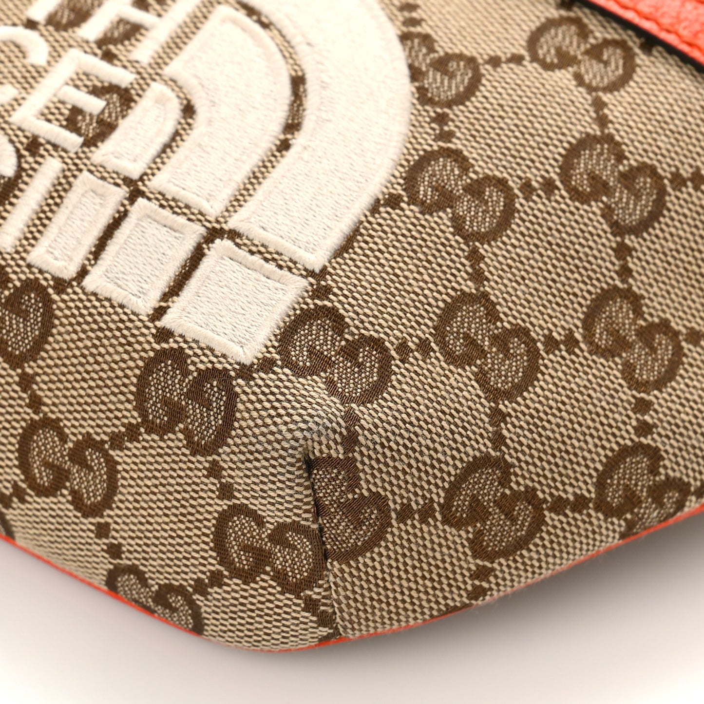 X THE NORTH FACE Monogram Textured Dollar Calfskin Embroidered Belt Bag Beige Ebony Mystic White Deep Orange