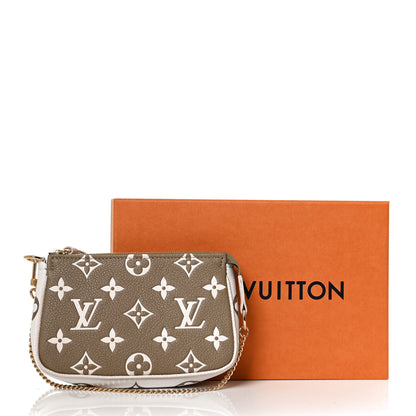 Louis Vuitton Empreinte Spring in the City Mini Pochette Accessories Kaki Beige Cream 8 of 8