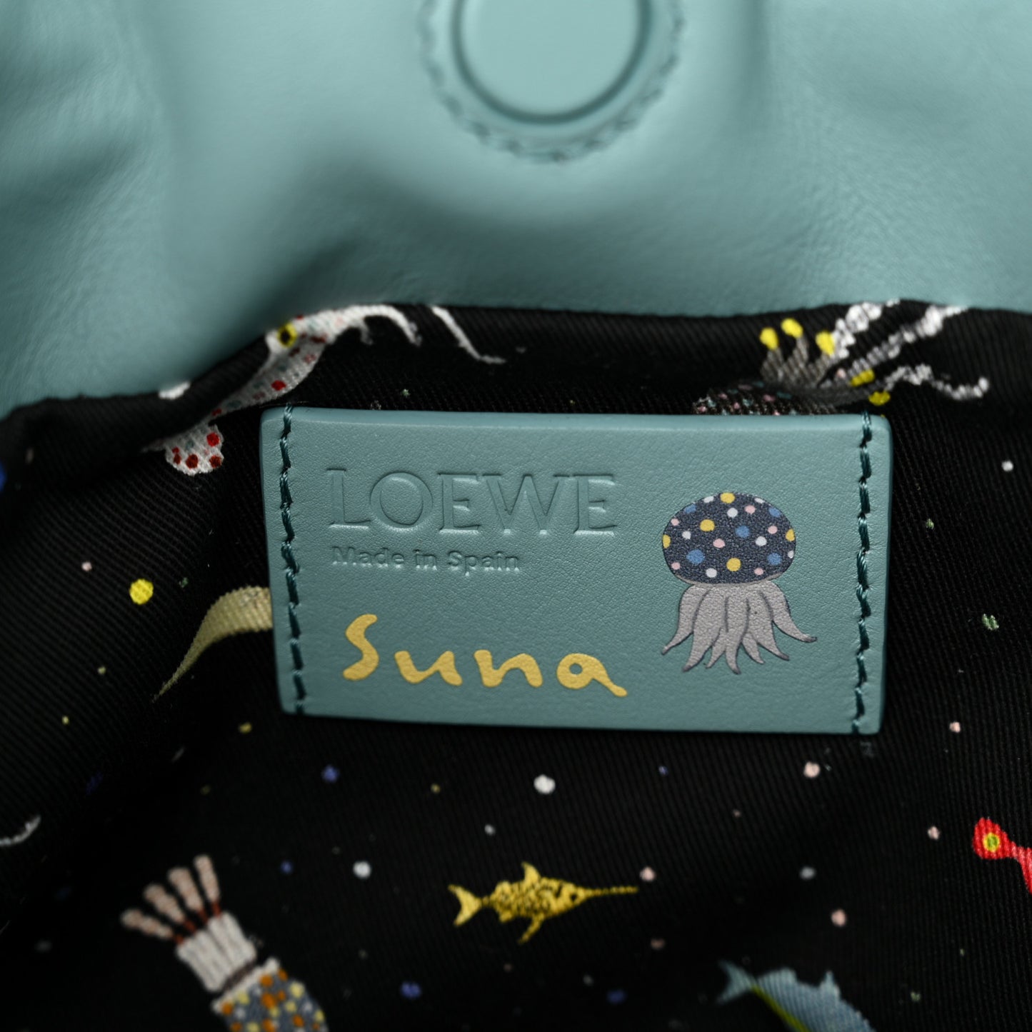 X SUNA FUJITA Nappa Flamenco Knot Clutch Ocean
