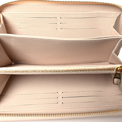 Louis Vuitton LOUIS VUITTON Empreinte Monogram Giant By The Pool Zippy Wallet Cream Saffron 5 of 8