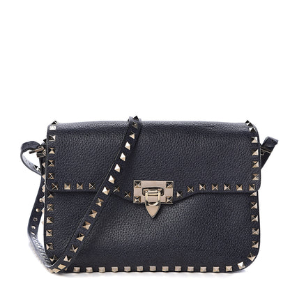 Valentino Garavani Pebbled Calfskin Medium Rockstud Flap Saddle Bag Deep Denim 1 of 11