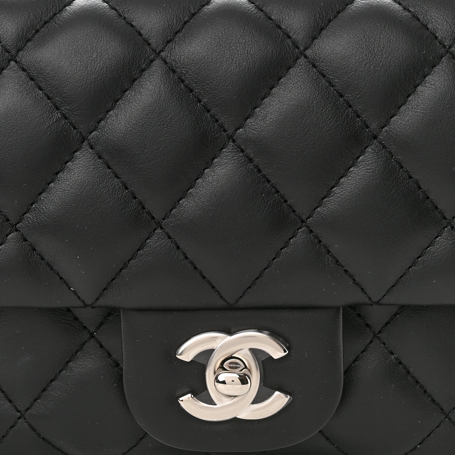 close up image of chanel calfskin leather in black by FASHIONPHILE