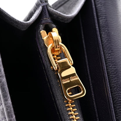 Miu Miu Distressed Nappa Vertical Quilted Flap Wallet Mirtillo 10 of 12