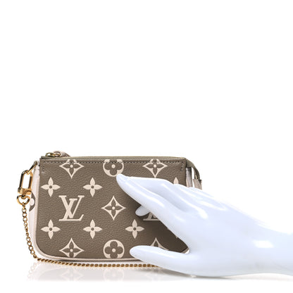 Louis Vuitton Empreinte Spring in the City Mini Pochette Accessories Kaki Beige Cream 2 of 6