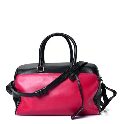 Saint Laurent Smooth Calfskin Bi-Color Duffle 6 Fuchsia Black 1 of 4