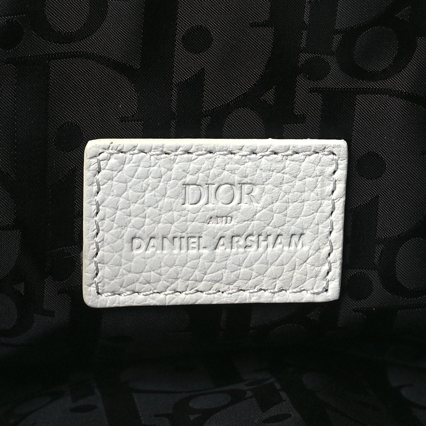 X DANIEL ARSHAM Grained Calfskin Newspaper Print Saddle Bag White