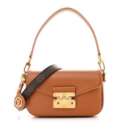 Louis Vuitton Calfskin Monogram Swing Cuir 1 of 14