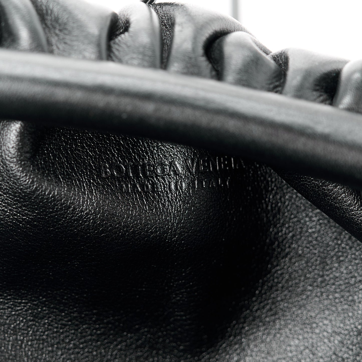 Butter Calfskin The Mini Pouch Black