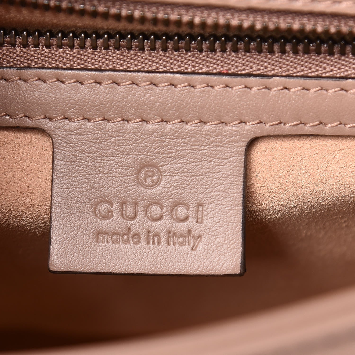 close up of an authentic GUCCI Calfskin Matelasse Small GG Marmont Top Handle Shoulder Bag Porcelain Rose FASHIONPHILE