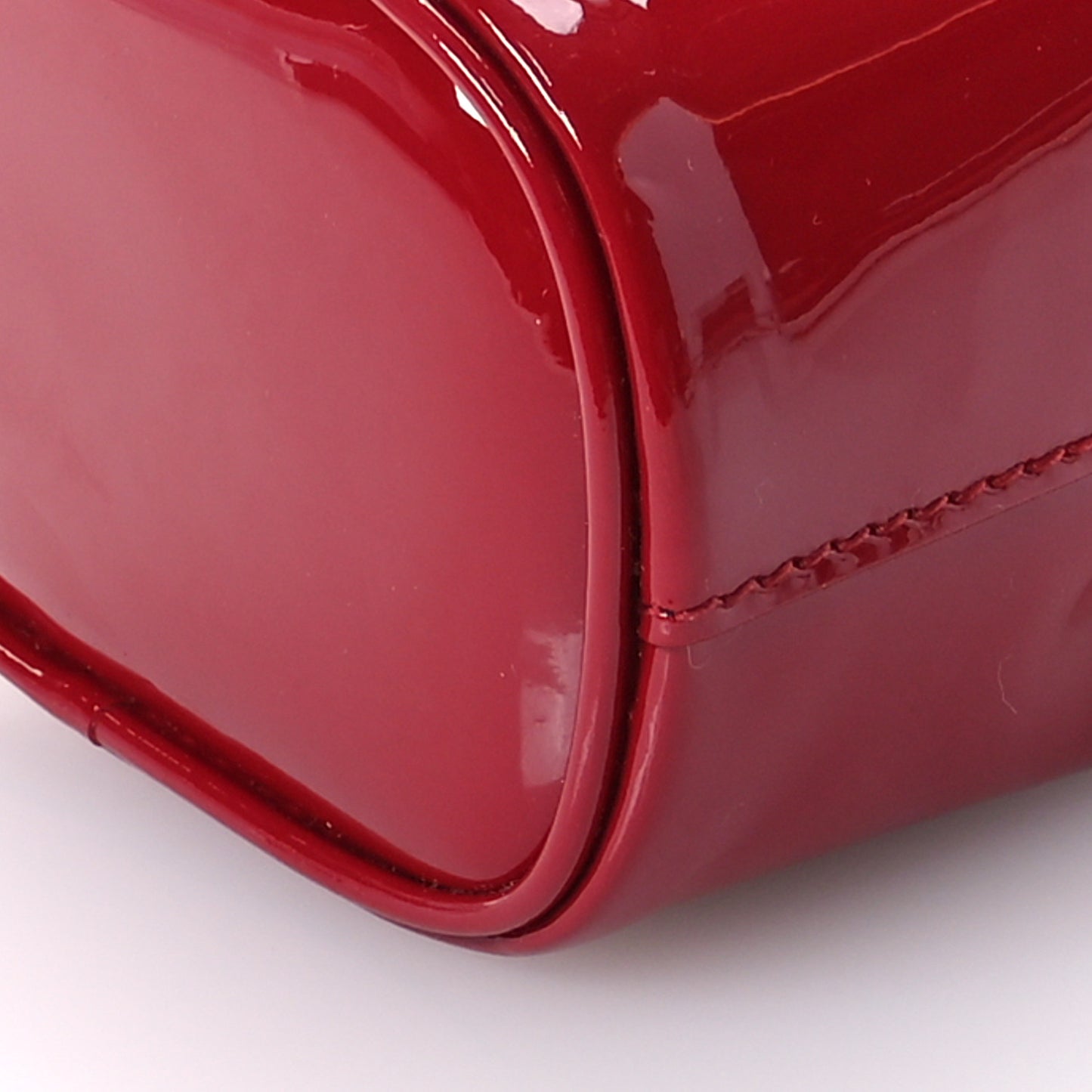 Vernice Metal Triangle Logo Mini Drawcord Pouch Shoulder Bag Cherry