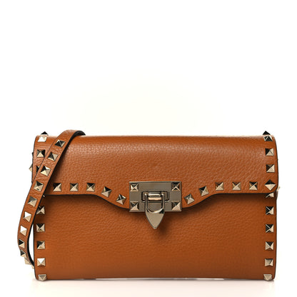 Valentino Garavani Pebbled Calfskin Medium Rockstud Flip Lock Crossbody Bag Bright Cognac 1 of 8