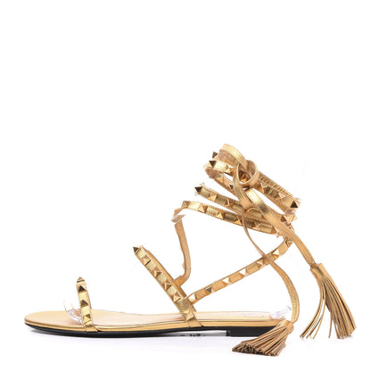 Valentino Garavani Metallic Nappa Rockstud Flair Ankle Wrap Flat Sandals 38 Deep Gold 1 of 9