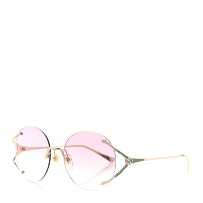 Gucci Metal Oversized Round Frame Sunglasses GG0645S Gold Blue 1 of 9