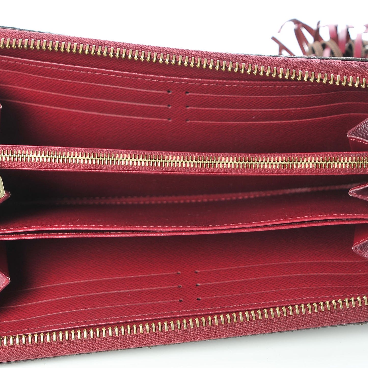 Monogram Pompon Zippy Wallet Fuchsia