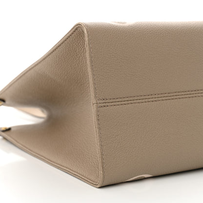 Louis Vuitton Empreinte Monogram Giant Onthego MM Tourterelle Creme 8 of 9