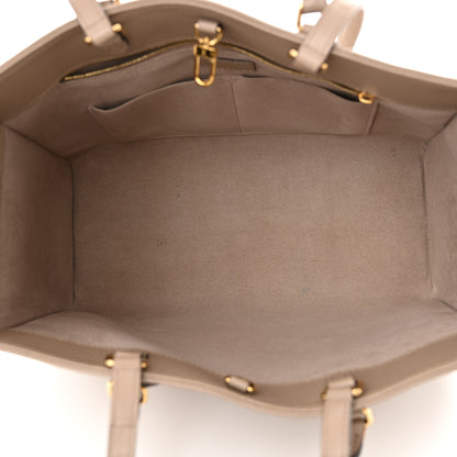 Louis Vuitton Empreinte Monogram Giant Onthego MM Tourterelle 5 of 21