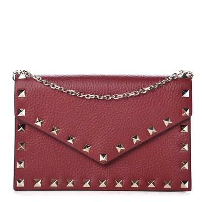 Valentino Garavani Pebbled Calfskin Rockstud Envelope Wallet on Chain Rubino 1 of 8