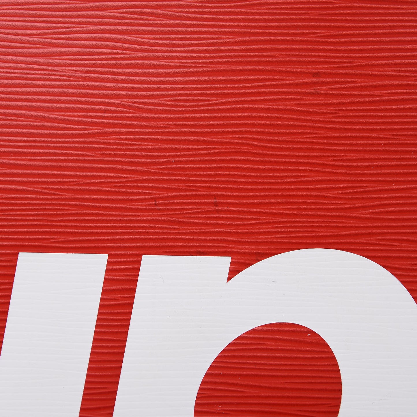 X SUPREME Epi Pochette Jour GM Red