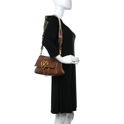 Valentino Garavani Pebbled Calfskin Small VRing Shoulder Bag Saddle Brown 3 of 8
