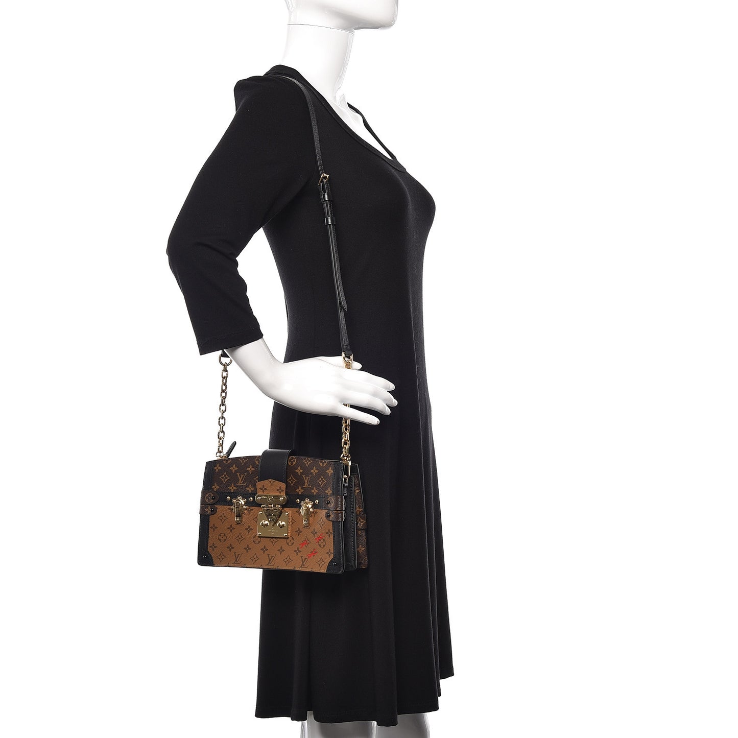 Reverse Monogram Trunk Clutch