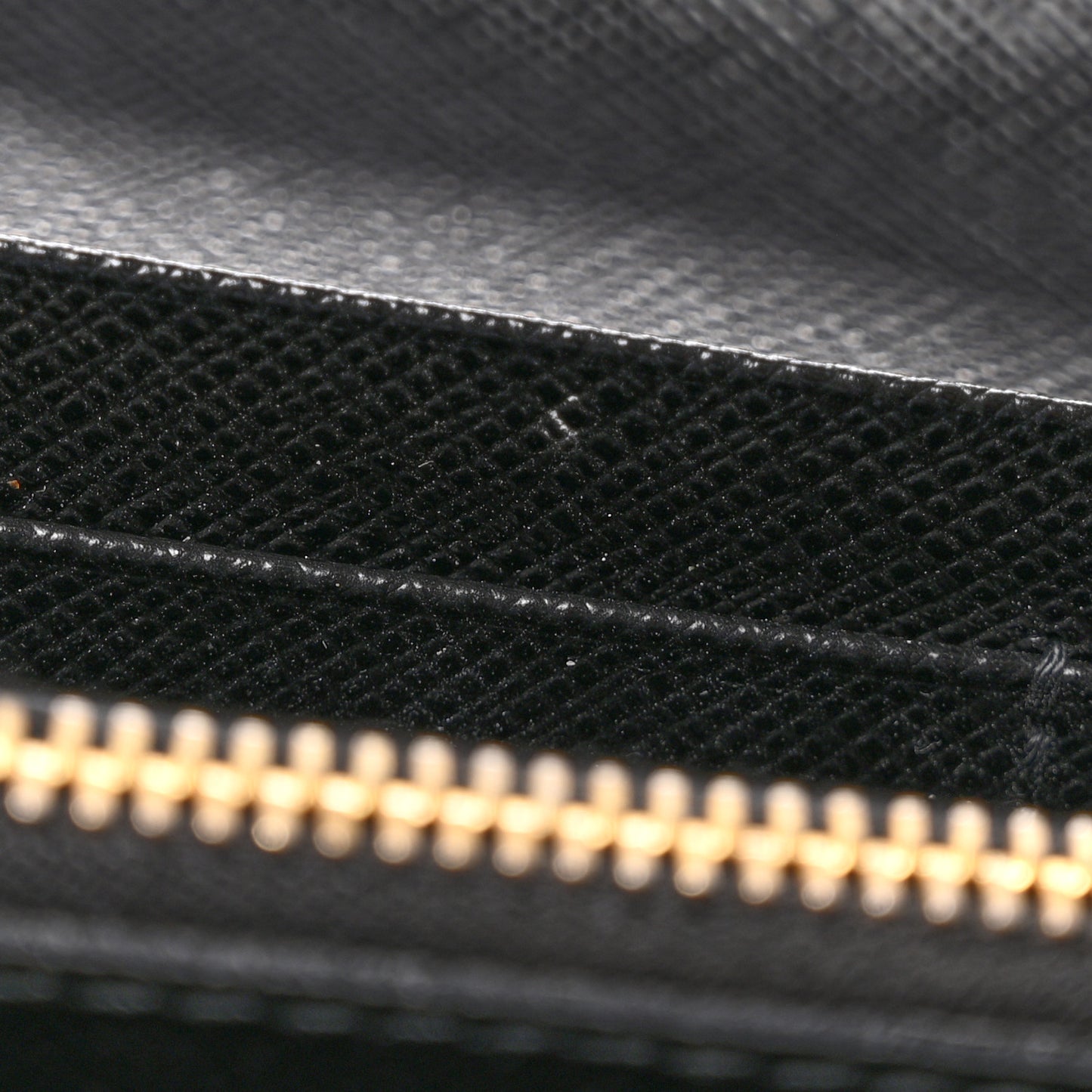 Saffiano Triangle Logo Continental Flap Travel Wallet Black