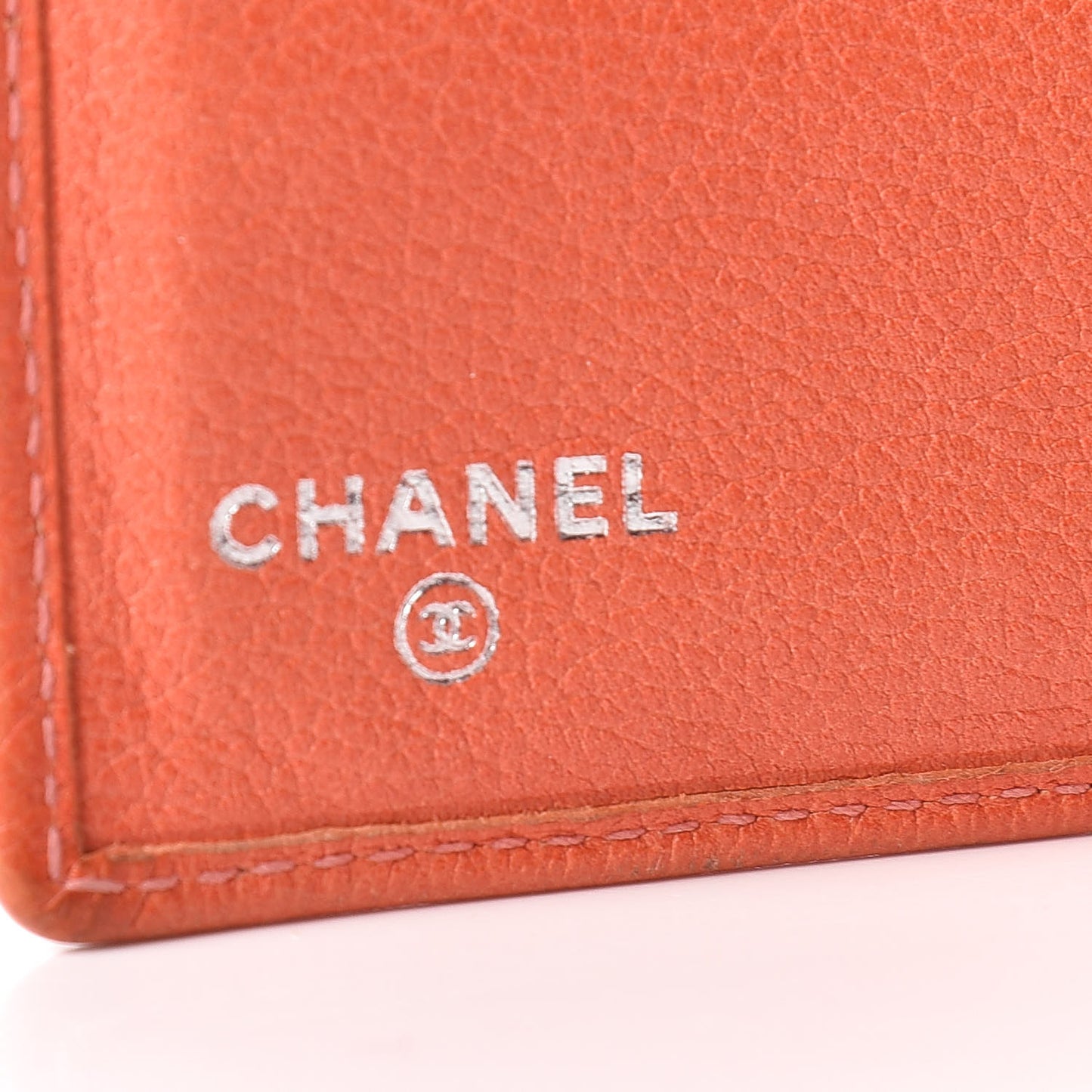 Goatskin Camellia Embossed Bi-Fold Wallet Coral