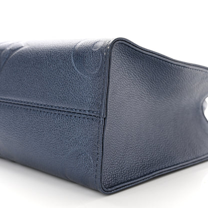 Louis Vuitton Metallic Empreinte Monogram Giant Onthego PM Navy Nacre 7 of 10