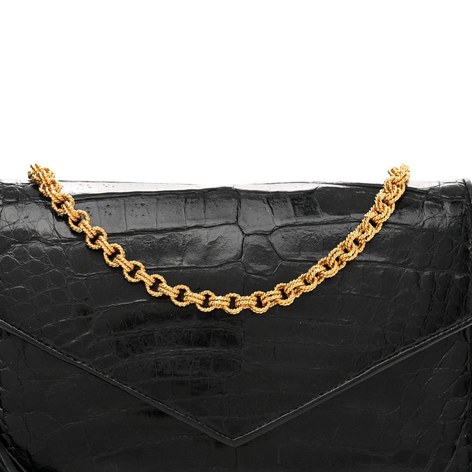 close up image of a chanel crocodile bag in black by FASHIONPHILE