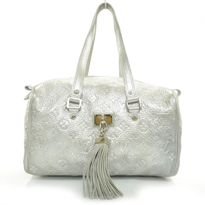 Louis Vuitton Monogram Shimmer Comete Silver 1 of 9