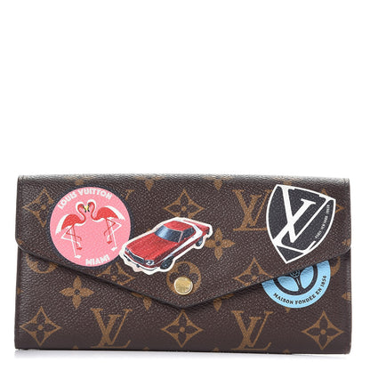 Louis Vuitton Monogram World Tour Sarah Wallet 1 of 7