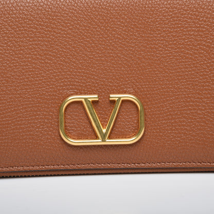 Valentino Garavani Grained Calfskin Vlogo Zip Around Wallet Saddle Brown 8 of 9