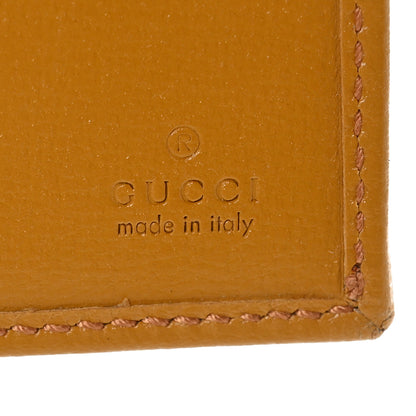Gucci GG Supreme Monogram Textured Calfskin Retro Interlocking G Passport Case Beige Yellow 6 of 6