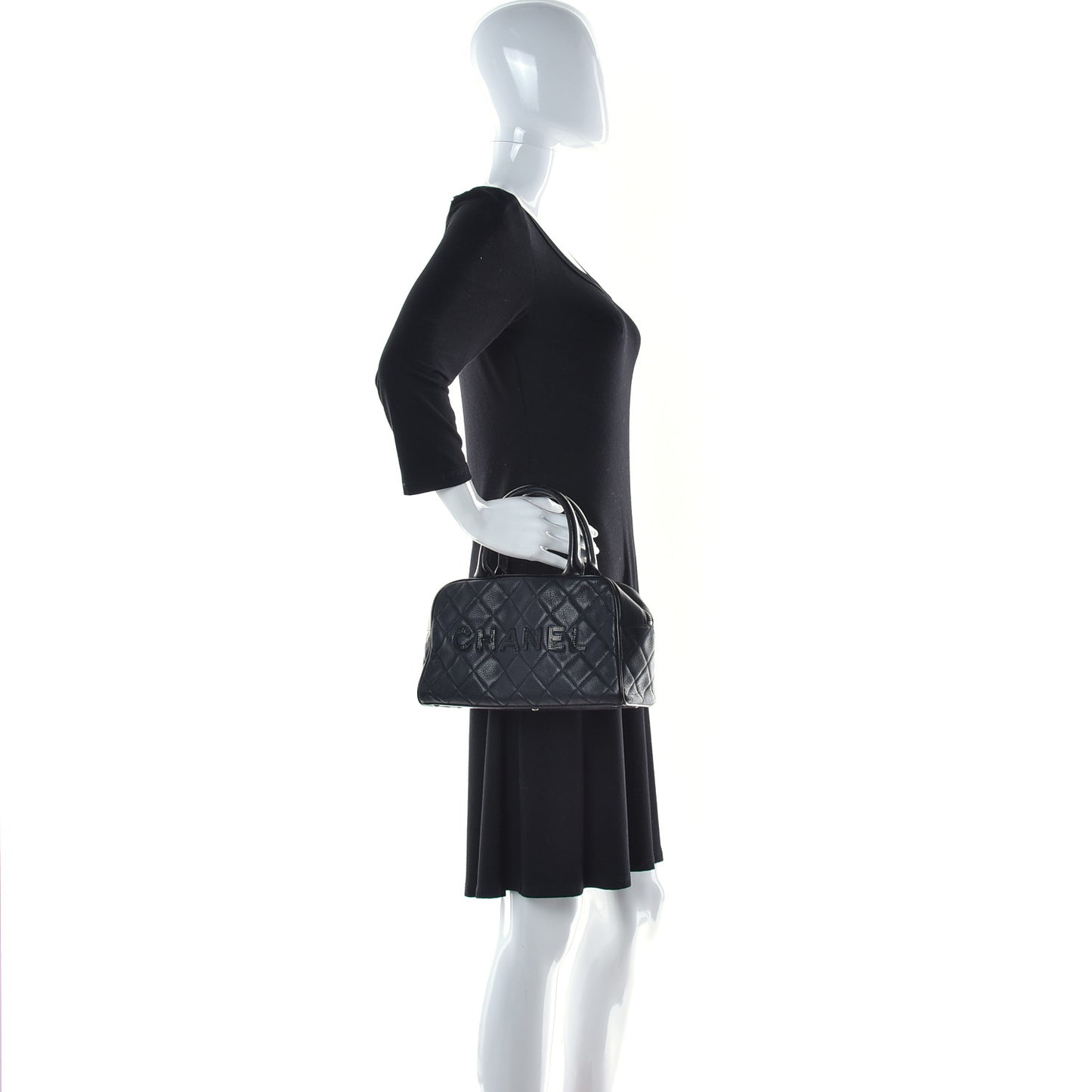 Caviar Patent Quilted Bowler Black